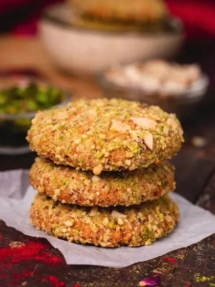 These are our special Dahi Ke Kebabs, with a crispy, golden-brown exterior made from pistachios and a soft, creamy yogurt filling inside. A true delight for the senses.