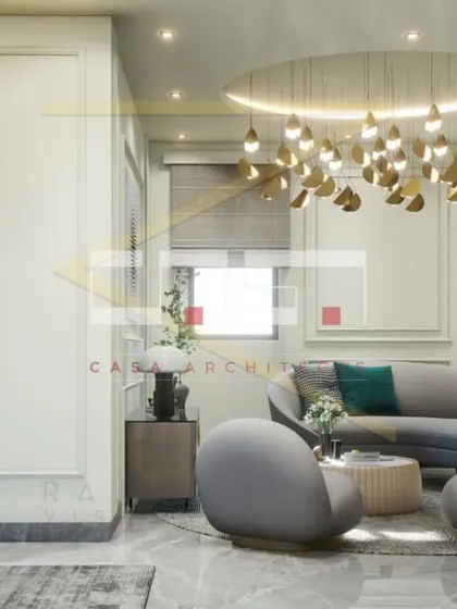 A render of a master bedroom suite with a separate seating area, featuring curved sofas, elegant wall paneling, and a stunning modern chandelier.