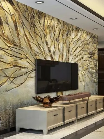 A 3D abstract wallpaper with a textured, metallic finish that resembles tree branches. This design adds a touch of rustic modernism and sophistication to a living room media wall.