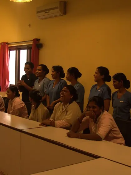 Our therapists enjoying a moment of laughter and camaraderie during a team event. A happy team ensures a positive and healing environment for our guests.