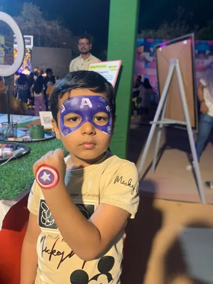 Captain America reporting for duty. We love creating superhero looks, complete with the iconic mask and a matching shield painted on the arm for the full effect.