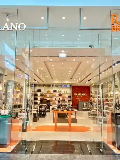 Our international work for Da Milano in Dubai. The design uses bright orange accents and clean white displays to create a fresh and modern look.
