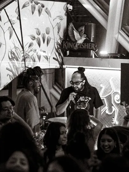 More than just a DJ, I’m an MC rooted in sound system culture. This shot captures me on the mic, hosting the night and keeping the crowd's energy high. I can run the show or just hype the vibe, whatever the event needs.