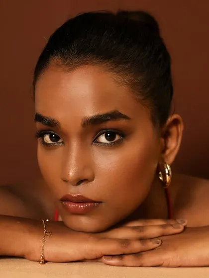 Flawless skin is an art. This raw, unedited shot shows how I perfect the base to look like real skin. The blending is seamless, creating a flawless finish for this beautiful dusky model.
