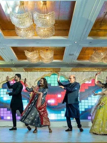 A full family performance with multiple generations on stage. These are the moments that truly define the "shaadi ka ghar" feeling.