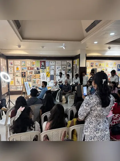 A full view of the demonstration setup at Abhinav Kala Mahavidyalaya, Pashan. It was a special honor to paint my college mentor, Dr. Sanjay Bharti.