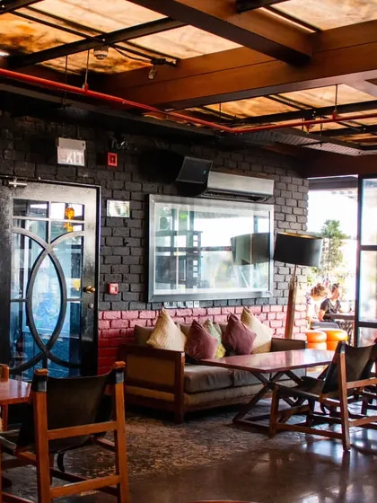 The terrace seating area, a perfect spot for a sundowner or a relaxed brunch.