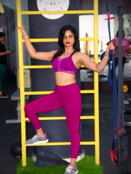 Feeling strong and confident after a great session. Posing by the monkey bars and TRX suspension trainers, two of my favorite tools for a full-body workout.
