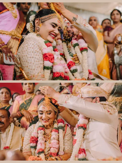 The Akshataropanam ceremony, where the couple showers each other with sanctified rice. The bride's joyful expression makes this a standout moment.