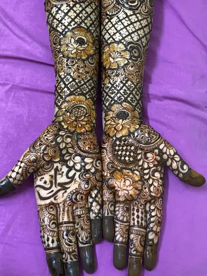 This is a detailed view of my intricate bridal henna work. Each design is unique, combining traditional patterns like paisleys and mandalas with fine-line fillers to create a stunning, full-coverage look for your special day.