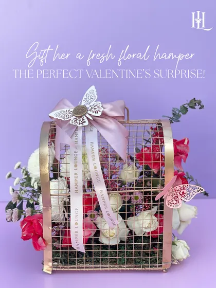 The full view of the floral birdcage hamper, a perfect Valentine's gift that is both delicate and striking.