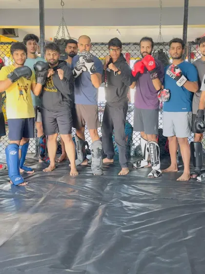 One big team, one big family. A group of our students posing together after a striking class.