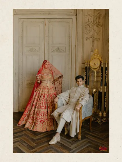 A classic portrait of the king and queen, exuding power and grace. The composition and vintage setting make this a truly timeless image.