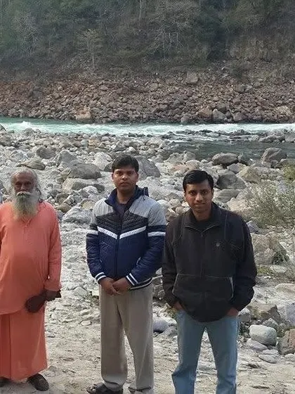 On the banks of the Ganges with my Guruji. These early moments in the Himalayas shaped my perspective and set me on a path of service and spiritual seeking.