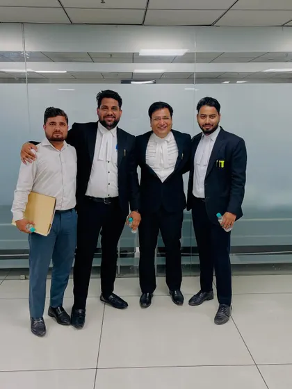 With colleagues and the Additional Secretary of the Saket Bar Association. A strong professional network is essential in the legal field.