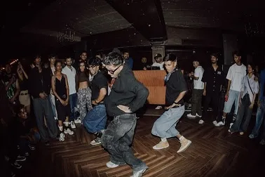 My crew and I in sync during a performance at Auro Kitchen & Bar. We specialize in creating these high-energy moments that become the highlight of the night.