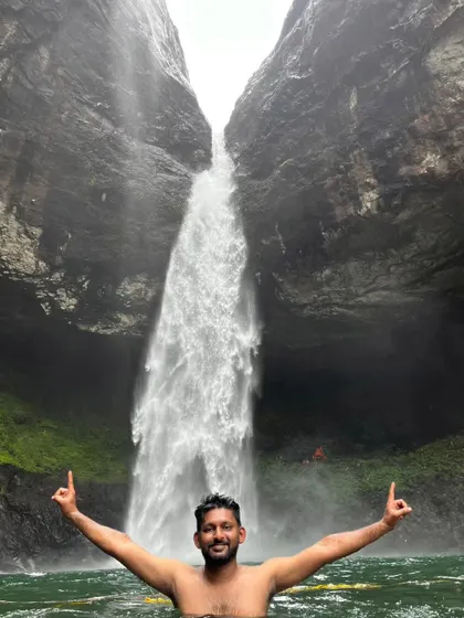 A triumphant moment, taking a dip in the cool, refreshing waters of the Devkund waterfall pool.