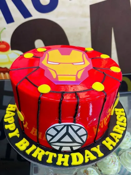 A bold 1.5kg Iron Man cake featuring his iconic mask and arc reactor.