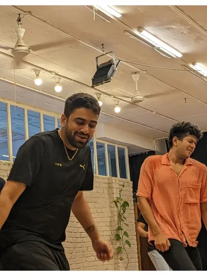 The class is full of energy and smiles as they follow along with the choreography.