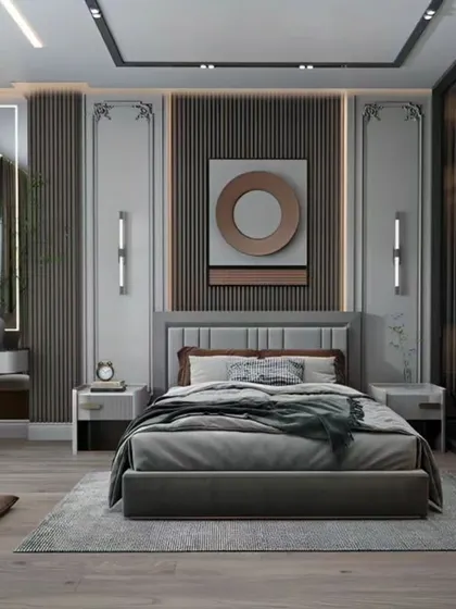 A sophisticated bedroom with a mix of classic paneling and modern fluting, complete with a vanity nook and a glass-door wardrobe.