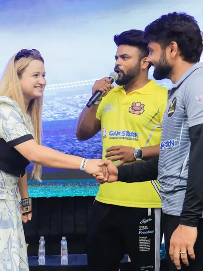 Shaking hands with the organizers and players at the WCC.