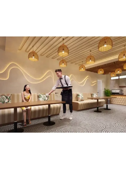 This image captures the cafe's service in action, showing how the design creates a pleasant environment for both customers and staff.