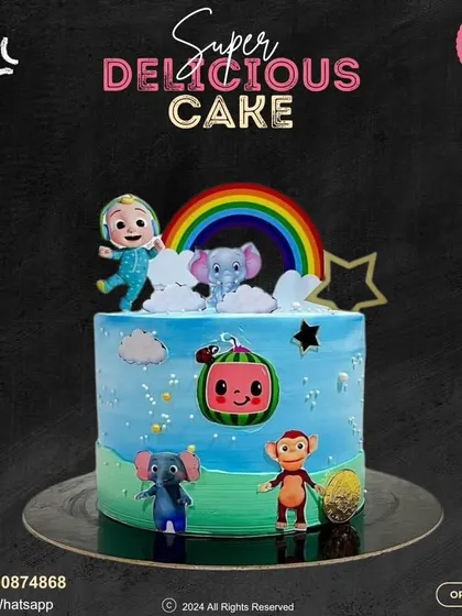 A sweet and simple Cocomelon cake perfect for a toddler's birthday. This design features JJ, an elephant, a monkey, and the iconic watermelon under a bright rainbow.