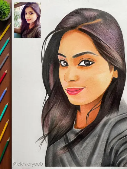 This A4 colored pencil portrait has a beautiful, soft quality. I focused on capturing her gentle expression and the flow of her hair.