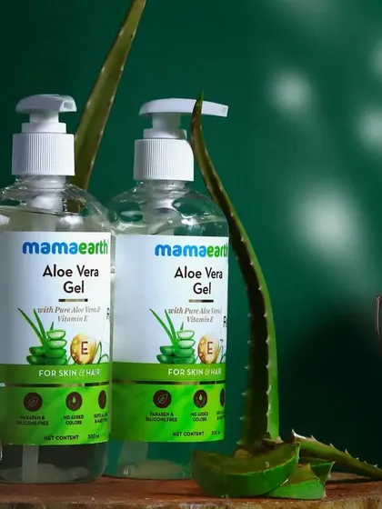 Another angle of the Mamaearth Aloe Vera Gel setup, this time with softer lighting to create a gentle, caring mood for the skincare product.