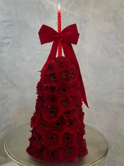 Another view of my fresh gerbera Christmas tree. It's a warm and festive take on holiday decor, perfect for someone looking for something different from a traditional pine tree.