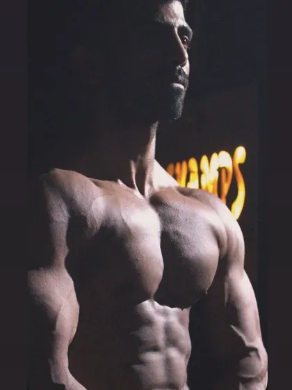 I call myself the Promaker, and this is the physique that backs it up. This dramatic shot captures the conditioning and muscle definition that I not only teach but also live by every single day.