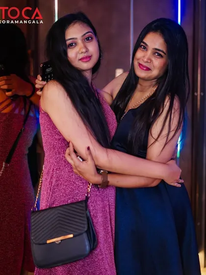 Two friends enjoying the party and the great music.
