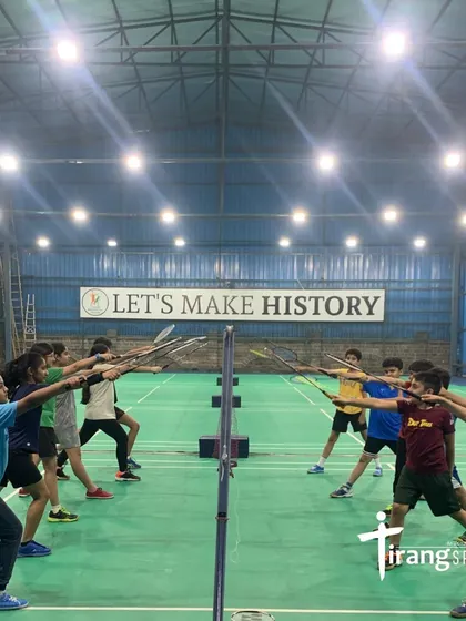 Discipline, focus, and teamwork are at the heart of our training. This powerful image of our young athletes in a synchronized lunge drill perfectly captures the spirit and dedication we instill, right under our motto: "Let's Make History."