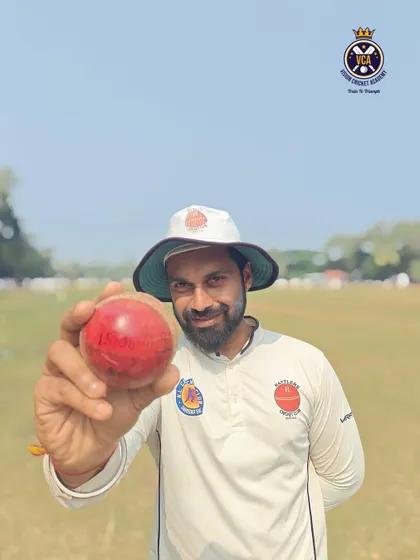 Our player and coach, Shreenesh Shah, holding the ball after his historic 10-wicket haul in a Kanga League match. He demonstrates the skill and dedication we instill in our players.