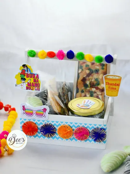 Another one of our festive Holi hampers. This one comes in a decorated white tray and includes our thandai tea cake and other goodies, perfect for gifting to friends and family.