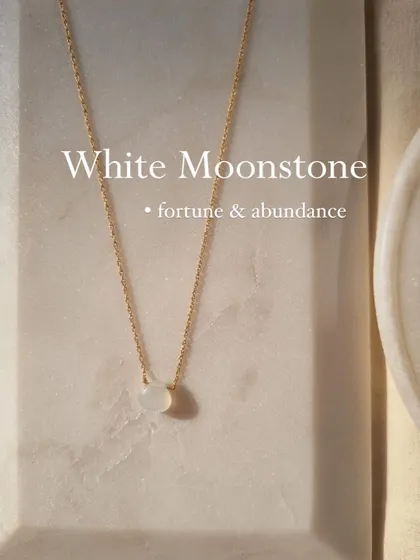 The 'Badamcha' White Moonstone heart-shaped drop pendant is for fortune and abundance.
