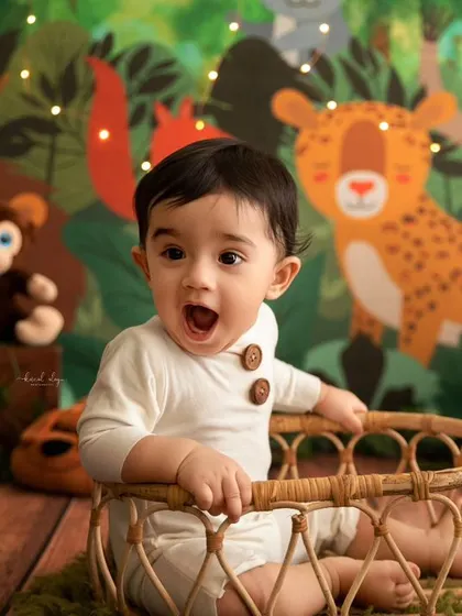 An expressive shot from a jungle-themed sitter session, capturing a look of awe and wonder.