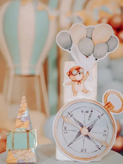 A duplicate of the adorable travel-themed cake topper.