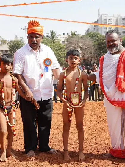 Two young brothers, both winners in their respective wrestling categories.