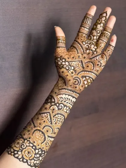 This is a detailed view of my intricate bridal henna work. Each design is unique, combining traditional patterns like paisleys and mandalas with fine-line fillers to create a stunning, full-coverage look for your special day.