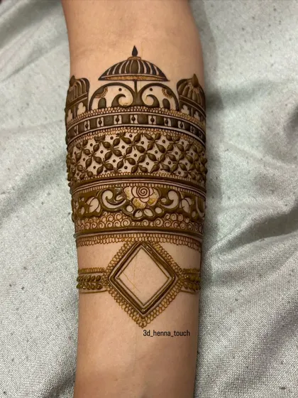 The completed doli arm band, a masterpiece of traditional bridal art.