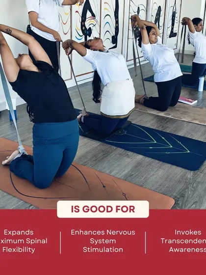 Using props like straps in backbends helps to expand spinal flexibility and enhance nervous system stimulation, leading to deeper transcendental awareness.