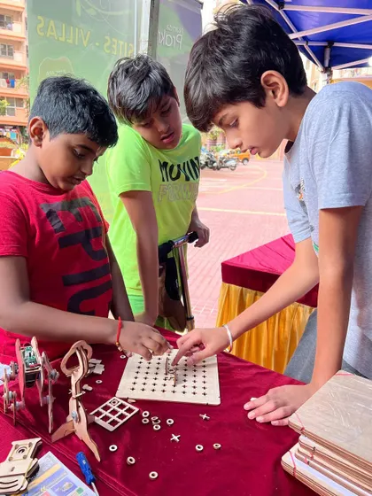 Absolutely splendid! These pictures capture the fun and discovery at one of our event stalls. Kids of all ages get to stop by, tinker with our kits, and get a taste of what it's like to be a maker.