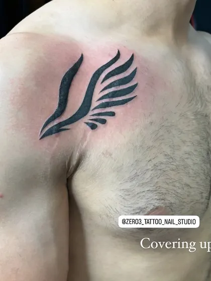 The process of covering up old marks with a new design. Careful placement and a solid design are key to a successful cover-up.