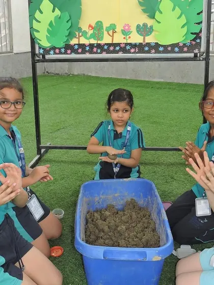 As part of 'The Seed Week', students get their hands dirty making seed balls, a fun, eco-friendly activity that connects them with nature.
