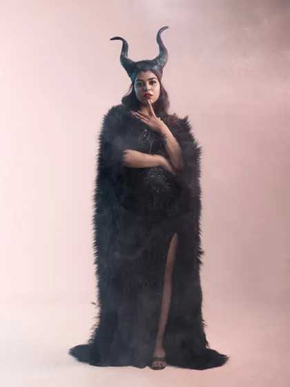 Transform into your favorite character with my fantasy costume collection. This complete Maleficent outfit, including the iconic horns and feathered cape, is perfect for themed parties or a dramatic photoshoot.