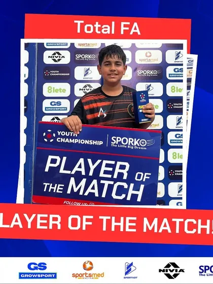 Moments like these define champions. A player proudly displays his Player of the Match award.