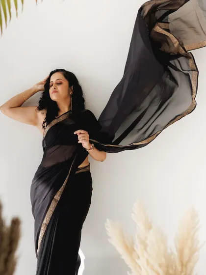 A duplicate of the dramatic flowing saree shot.