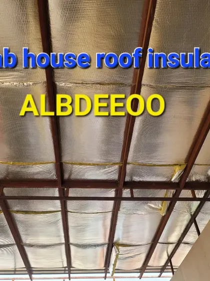 A look at the underside of a roof with insulation installed. We use reflective insulation sheets to block radiant heat, keeping the interior cool and comfortable.
