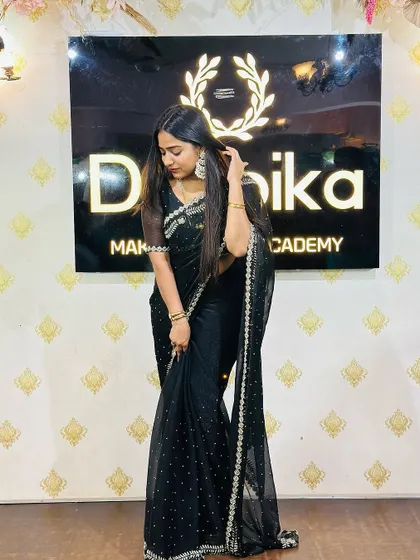 Another shot in my favorite black saree. The right posture and a confident smile can elevate any look.